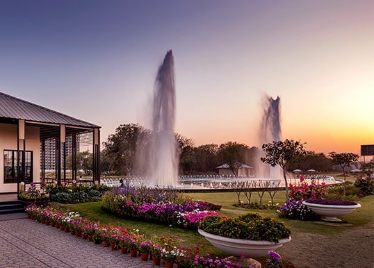 Enjoy the scenic view of the Twin Fountain at Central Park The Orchard 
